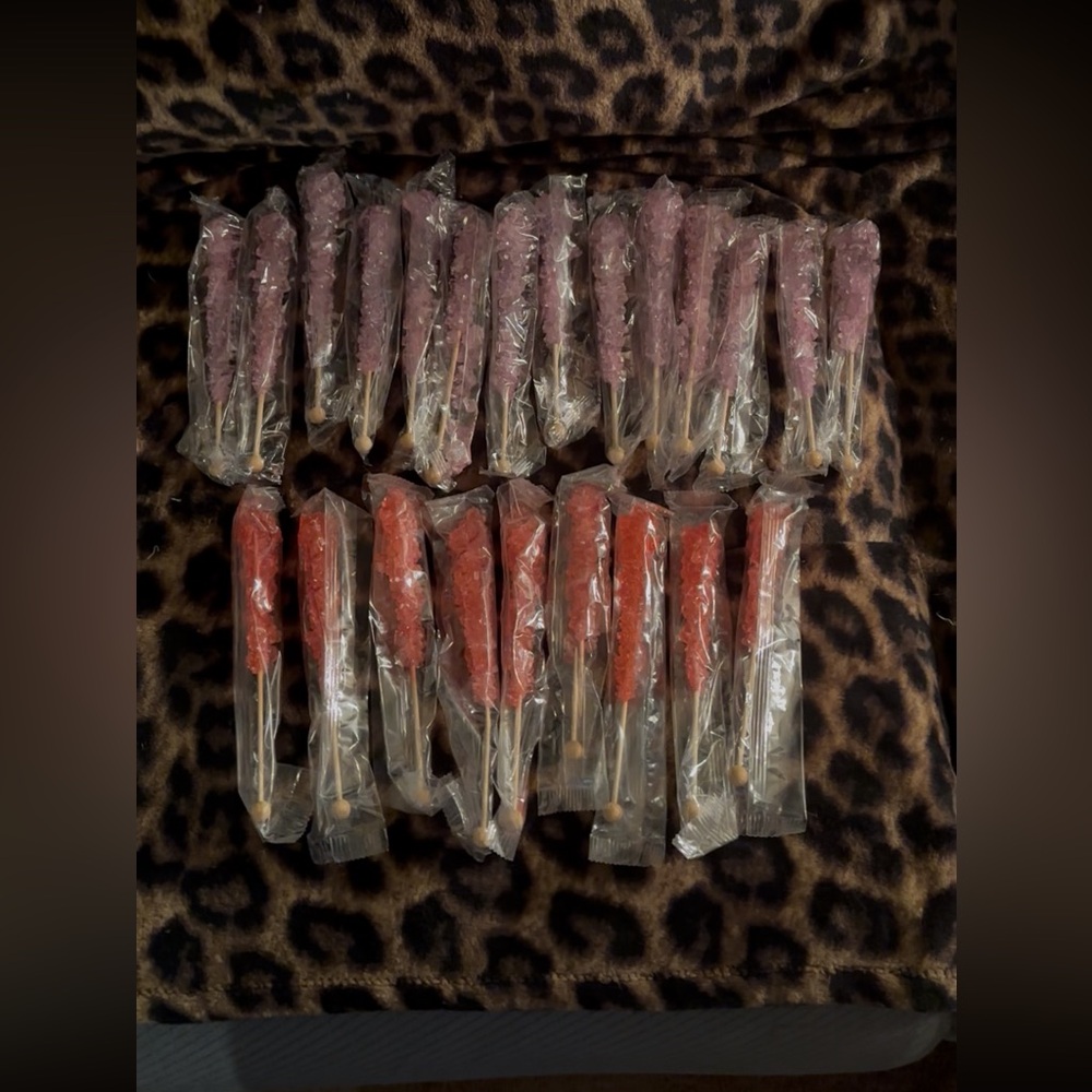 23 Assorted Rock Candy Sticks individually wrapped.